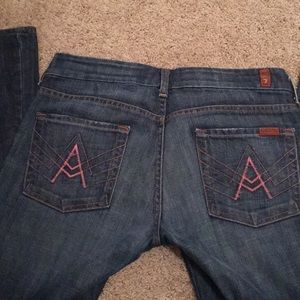 7 For All Mankind Women's Dark Blue Boot Cut Jeans with Pink Pocket Stitching